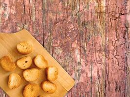 Bread On Wooden Background photo