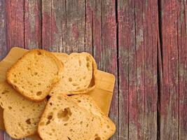 Bread On Wooden Background photo