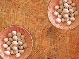 Nuts On The Wooden Background photo