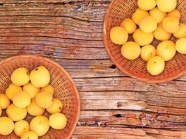 Apricots On The Wooden Background photo