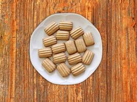 Cookies On The Wooden Background photo