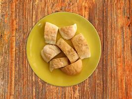 Bread On Wooden Background photo