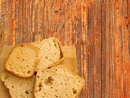 Bread On Wooden Background photo