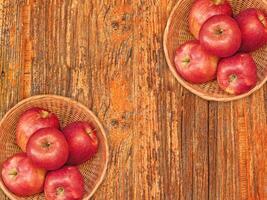 Apples On The Wooden Background photo