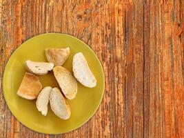 Bread On Wooden Background photo