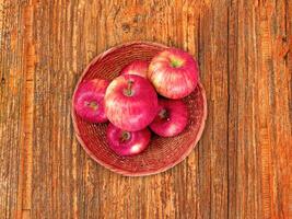 Apples On The Wooden Background photo