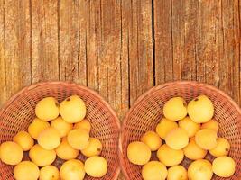 Apricots On The Wooden Background photo