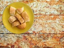 Bread On Wooden Background photo