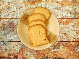 Bread On Wooden Background photo