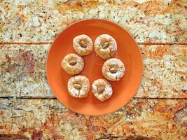 Cookies On The Wooden Background photo