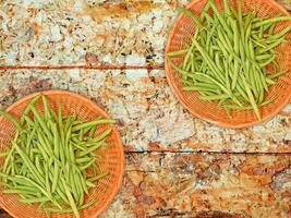 Green Bean Vegetable On Wooden Background photo