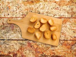 Bread On Wooden Background photo