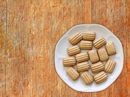 Cookies On The Wooden Background photo