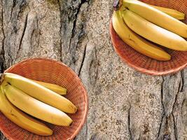 Bananas On The Wooden Background photo