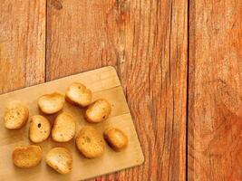 Bread On Wooden Background photo