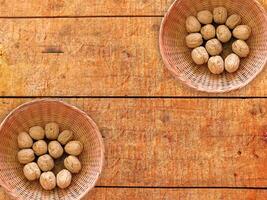 Nuts On The Wooden Background photo