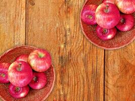 Apples On The Wooden Background photo