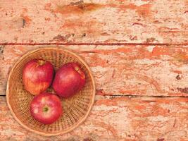 Apples On The Wooden Background photo