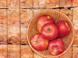 Apples On The Wooden Background photo