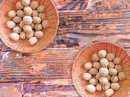 Nuts On The Wooden Background photo