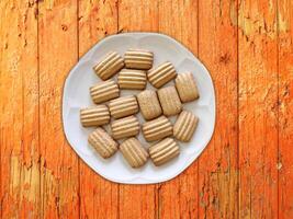 Cookies On The Wooden Background photo