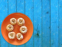 Cookies On The Wooden Background photo