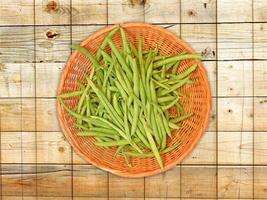 Green Bean Vegetable On Wooden Background photo