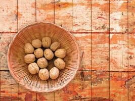 Nuts On The Wooden Background photo