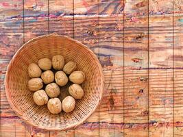 Nuts On The Wooden Background photo