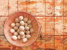 Nuts On The Wooden Background photo