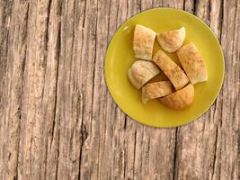 Bread On Wooden Background photo