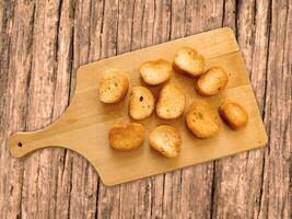 Bread On Wooden Background photo