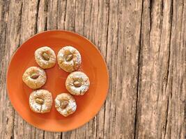 Cookies On The Wooden Background photo