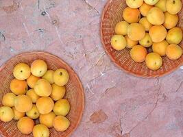 Apricots On Marble Background photo