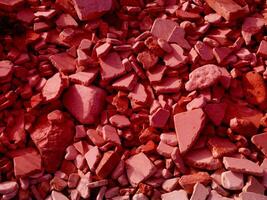 textura de piedra roja en el jardín foto