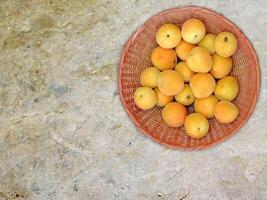 Apricots On Marble Background photo