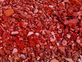 textura de piedra roja en el jardín foto