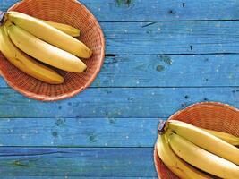 Bananas On The Wooden Background photo