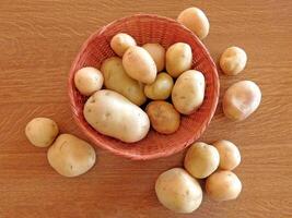 Potatoes In The Kitchen On Background photo