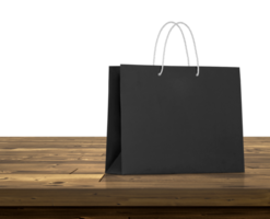 Empty shopping bags on wooden table, transparent background png