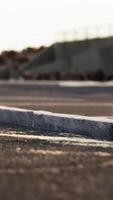 Empty beach car park spaces covered in asphalt. video