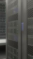 room with rows of supercomputers turned on video