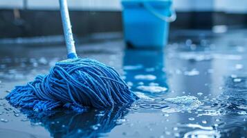 AI generated Mop placed on laminate floor with bucket of water in the background for cleaning purposes photo