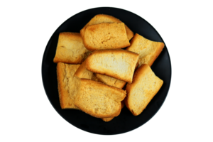 Slices of roasted toast on a black plate isolated on a transparent background png