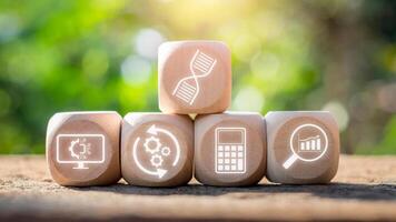 Bioinformatics concept, Wooden block on desk with bioinformatics icon on virtual screen. photo