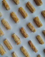 Close up of a lot of sweet buns on a white background photo