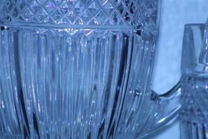 Crystal Pitcher With Stemware Glasses Close Up. photo