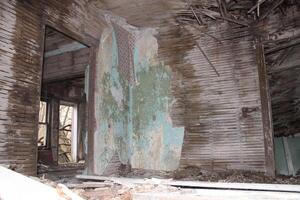 Ruins Of An Abandoned House In The Woods photo