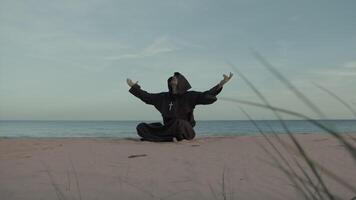 Monk Asks For Help From The Most High Almighty Sitting On The Beach In Prayer video