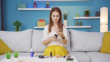 Young woman spraying perfume, good smell. video